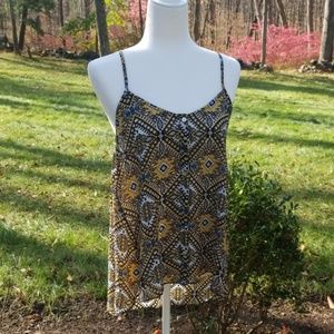 Ladies multicolor sleeveless button down top